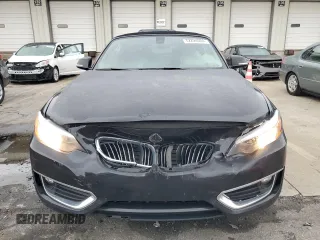 2016 BMW 2 Series 228i xDrive with VIN WBA1L9C55GV325194, listed as a Copart auction lot 72224004 with 134,063 mi miles and Salvage Title. Bid and sale history available at carsss.com. Image 5.