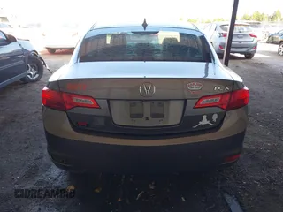 2014 Acura ILX Premium with VIN 19VDE1F51EE006621, listed as a IAAI auction lot 41984539 with 165,585 mi miles and . Bid and sale history available at DreamBid. Image 16.