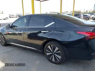 2019 Nissan Altima 2.5 SV with VIN 1N4BL4DV5KC171640, listed as a IAAI auction lot 41845529 with 70,615 mi miles. Bid and sale history available at carsss.com. Image 14.