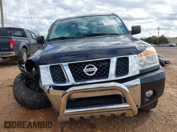 2012 Nissan Titan S with VIN 1N6AA0EC1CN322929, listed as a IAAI auction lot 41792414 with 124,182 mi miles. Bid and sale history available at carsss.com. Image 12.