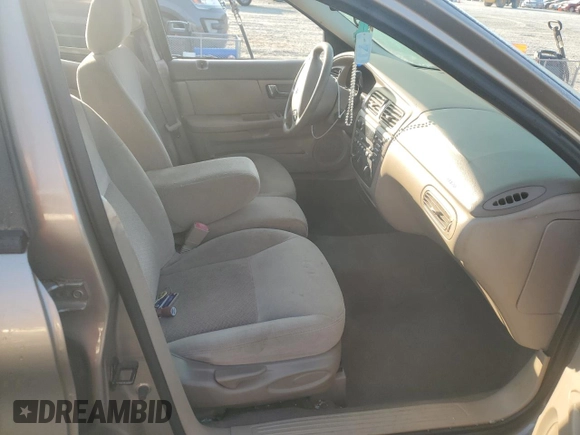2003 Ford Taurus z VIN 1FAFP52253A170456, wystawiony jako Copart lot #70009824 z przebiegiem 216 567 mil mil oraz Szkoda całkowita • Salvage title. Historia ofert i sprzedaży dostępna na DreamBid. Obrazek 7.