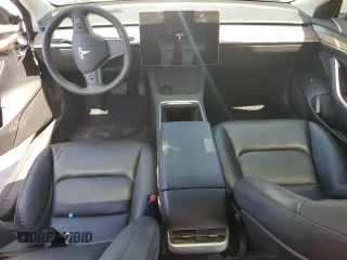 2023 Tesla Model 3 with VIN 5YJ3E1EA8PF704349, listed as a Copart auction lot 60220665 with 18,873 mi miles and Non repairable. Bid and sale history available at DreamBid. Image 8.
