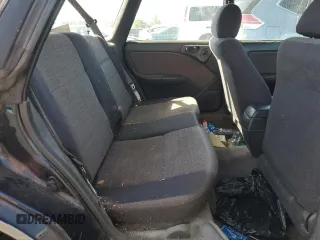 1996 Subaru Legacy with VIN 4S3BG4859T6986223, listed as a Copart auction lot 57683345 with 265,568 mi miles and Salvage title. Bid and sale history available at DreamBid. Image 11.