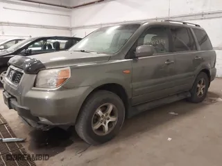 2007 Honda Pilot EX-L with VIN 5FNYF18557B009179, listed as a IAAI auction lot 41952140 with 300,471 mi miles. Bid and sale history available at carsss.com. Image 2.
