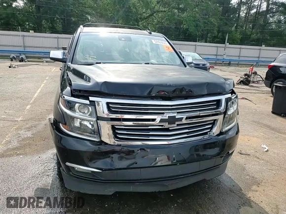2016 Chevrolet Tahoe LTZ with VIN 1GNSCCKCXGR264655, listed as a Copart auction lot 57456625 with 237,621 mi miles and Salvage title. Bid and sale history available at DreamBid. Image 14.