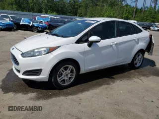 2019 Ford Fiesta SE z VIN 3FADP4BJ2KM147288, wystawiony jako Copart lot #55391125 z przebiegiem 83 887 mil mil oraz Szkoda całkowita • Salvage title. Historia ofert i sprzedaży dostępna na DreamBid. Obrazek 1.