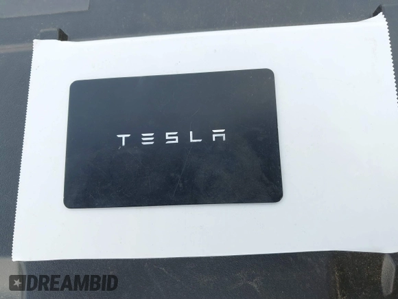 2023 Tesla Model 3 with VIN 5YJ3E1EA2PF623217, listed as a IAAI auction lot 41701413 with 21,246 mi miles and . Bid and sale history available at DreamBid. Image 11.