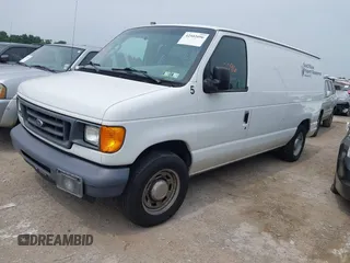 2006 Ford Econoline Cargo with VIN 1FTRE14WX6HB10268, listed as a IAAI auction lot 42502096 with 128,791 mi miles and . Bid and sale history available at DreamBid. Image 2.
