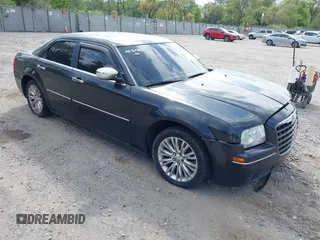 2006 Chrysler 300 Touring with VIN 2C3KA53G36H220558, listed as a IAAI auction lot 42159373 with 158,970 mi miles. Bid and sale history available at carsss.com. Image 1.