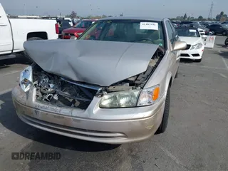2001 Toyota Camry CE z VIN 4T1BG22K51U083381, wystawiony jako IAAI lot #41482936 z przebiegiem 84 219 mil mil oraz . Historia ofert i sprzedaży dostępna na DreamBid. Obrazek 17.