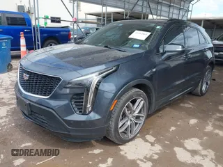 2019 Cadillac XT4 FWD Sport z VIN 1GYFZER49KF215843, wystawiony jako IAAI lot #41912861 z przebiegiem 102 922 mil mil oraz . Historia ofert i sprzedaży dostępna na DreamBid. Obrazek 21.