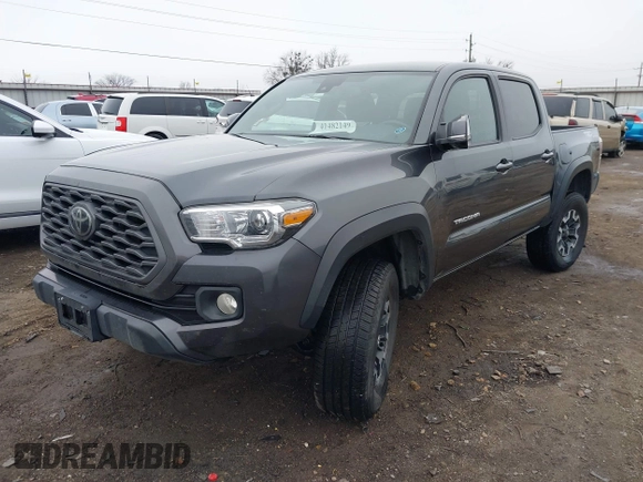 2022 Toyota Tacoma SR with VIN 3TMCZ5AN4NM476170, listed as a IAAI auction lot 41482149 with 57,126 mi miles and . Bid and sale history available at DreamBid. Image 17.