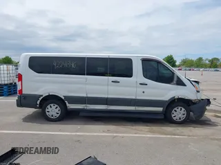 2015 Ford Transit XL with VIN 1FBZX2ZM8FKA42597, listed as a IAAI auction lot 42241346 with 195,673 mi miles and . Bid and sale history available at DreamBid. Image 14.