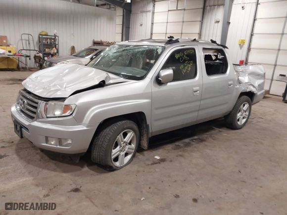 2014 Honda Ridgeline RTL with VIN 5FPYK1F57EB012362, listed as a IAAI auction lot 41078509 with 149,590 mi miles. Bid and sale history available at carsss.com. Image 2.