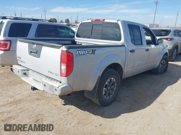 2018 Nissan Frontier SV with VIN 1N6AD0EV0JN761092, listed as a IAAI auction lot 41502701 with 103,900 mi miles and . Bid and sale history available at DreamBid. Image 4.