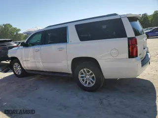 2015 Chevrolet Suburban LT with VIN 1GNSCJKC2FR738634, listed as a Copart auction lot 53527545 with 259,856 mi miles and Salvage Title. Bid and sale history available at carsss.com. Image 2.