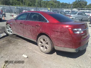 2014 Ford Taurus SEL with VIN 1FAHP2E87EG139913, listed as a IAAI auction lot 40216089 with 95,336 mi miles and . Bid and sale history available at carsss.com. Image 3.