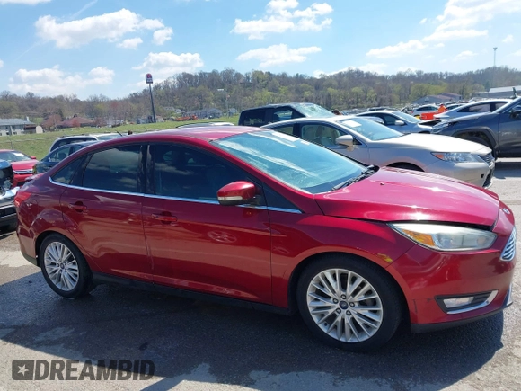 2015 Ford Focus Titanium with VIN 1FADP3J29FL230664, listed as a IAAI auction lot 41870083 with 125,578 mi miles and . Bid and sale history available at DreamBid. Image 13.