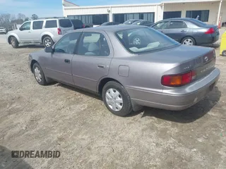 1996 Toyota Camry DX with VIN 4T1BG12K8TU762073, listed as a IAAI auction lot 41606136 with 254,939 mi miles. Bid and sale history available at carsss.com. Image 3.