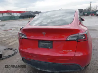 2023 Tesla Model Y Long Range with VIN 7SAYGDEE1PA169031, listed as a IAAI auction lot 41660766 with 35,253 mi miles and . Bid and sale history available at DreamBid. Image 17.