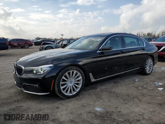 2018 BMW 7 Series 740i with VIN WBA7E2C54JG742927, listed as a Copart auction lot 70306082 with 69,735 mi miles. Bid and sale history available at carsss.com. Image 1.