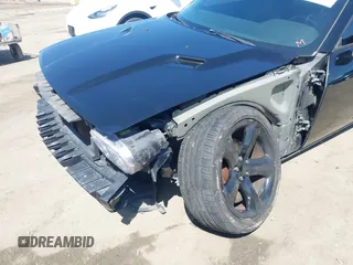 2014 Dodge Challenger R/T with VIN 2C3CDYBT8EH280622, listed as a IAAI auction lot 41973994 with 86,983 mi miles and . Bid and sale history available at DreamBid. Image 6.