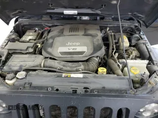 2016 Jeep Wrangler Unlimited Sahara с VIN 1C4HJWEG3GL235476, выставлен на аукционе Copart как лот 63342605 с пробегом 133 785 миль миль и Списание • Salvage title. История ставок и продаж доступна на DreamBid. Изображение 11.
