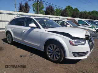 2015 Audi allroad Premium Plus with VIN WA1UFAFL2FA116305, listed as a Copart auction lot 60477934 with 126,696 mi miles and Salvage Title. Bid and sale history available at carsss.com. Image 4.