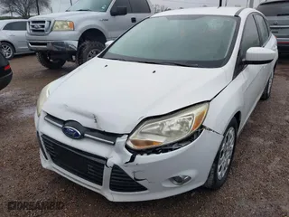 2012 Ford Focus SE with VIN 1FAHP3K20CL197291, listed as a IAAI auction lot 41643107 with 152,421 mi miles. Bid and sale history available at carsss.com. Image 6.