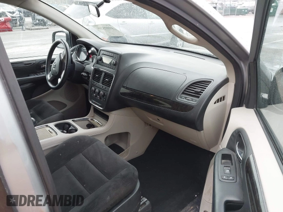 2016 Dodge Grand Caravan SXT with VIN 2C4RDGCG3GR321933, listed as a IAAI auction lot 41895209 with 186,502 mi miles and . Bid and sale history available at DreamBid. Image 5.