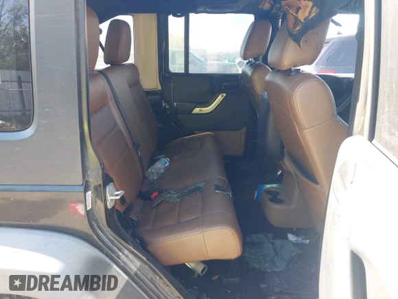 2011 Jeep Wrangler Unlimited Rubicon with VIN 1J4BA6H16BL615945, listed as a IAAI auction lot 42159418 with Not provided miles and . Bid and sale history available at DreamBid. Image 8.