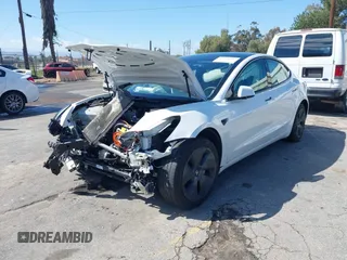 2023 Tesla Model 3 with VIN 5YJ3E1EA4PF462627, listed as a IAAI auction lot 41750103 with 38,463 mi miles and . Bid and sale history available at carsss.com. Image 19.