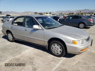 1996 Honda Accord Value with VIN 1HGCD5691TA249900, listed as a Copart auction lot 77683144 with 155,178 mi miles and Salvage Title. Bid and sale history available at DreamBid. Image 4.