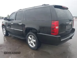 2011 Chevrolet Suburban LTZ with VIN 1GNSKKE32BR100379, listed as a IAAI auction lot 42115686 with 174,830 mi miles and . Bid and sale history available at DreamBid. Image 3.