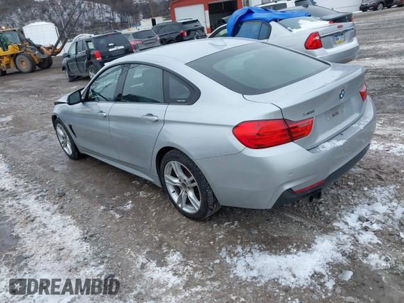 2016 BMW 4 Series 428i xDrive with VIN WBA4C9C53GG136870, listed as a IAAI auction lot 41410071 with 116,187 mi miles and . Bid and sale history available at DreamBid. Image 3.