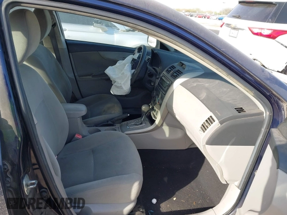 2012 Toyota Corolla L with VIN 2T1BU4EEXCC755207, listed as a IAAI auction lot 41847008 with 143,623 mi miles. Bid and sale history available at carsss.com. Image 5.