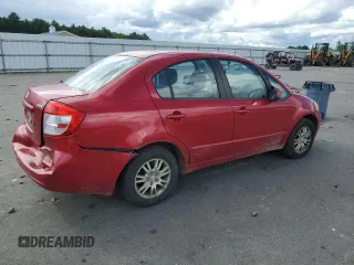 2012 Suzuki SX4 LE with VIN JS2YC5A34C6300079, listed as a Copart auction lot 68414434 with 111,661 mi miles and Salvage Title. Bid and sale history available at carsss.com. Image 3.