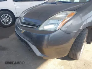 2007 Toyota Prius z VIN JTDKB20U873226409, wystawiony jako IAAI lot #42541909 z przebiegiem 128 374 mil mil oraz . Historia ofert i sprzedaży dostępna na DreamBid. Obrazek 6.
