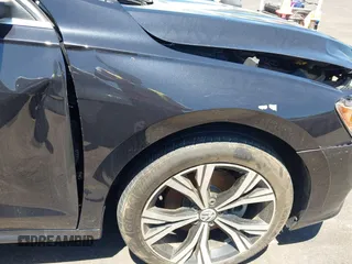 2021 Volkswagen Passat SE z VIN 1VWSA7A30MC003988, wystawiony jako IAAI lot #42238431 z przebiegiem 43 208 mil mil oraz . Historia ofert i sprzedaży dostępna na DreamBid. Obrazek 21.