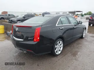 2014 Cadillac ATS Standard RWD with VIN 1G6AA5RX7E0112352, listed as a IAAI auction lot 42487515 with 98,009 mi miles and . Bid and sale history available at DreamBid. Image 4.