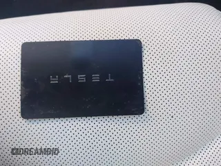 2021 Tesla Model S Long Range with VIN 5YJSA1E56MF453711, listed as a IAAI auction lot 41467603 with 115,634 mi miles and . Bid and sale history available at DreamBid. Image 11.