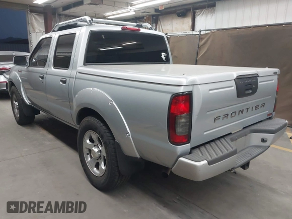 2001 Nissan Frontier z VIN 1N6MD27T01C384859, wystawiony jako IAAI lot #42058030 z przebiegiem 90 415 mil mil oraz . Historia ofert i sprzedaży dostępna na DreamBid. Obrazek 3.