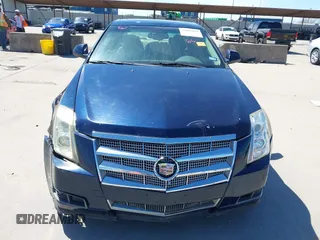 2008 Cadillac CTS AWD z VIN 1G6DH577980158801, wystawiony jako IAAI lot #41805061 z przebiegiem 99 579 mil mil oraz . Historia ofert i sprzedaży dostępna na DreamBid. Obrazek 6.
