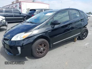2012 Toyota Prius One z VIN JTDKN3DU2C5495575, wystawiony jako IAAI lot #41905961 z przebiegiem 97 186 mil mil oraz . Historia ofert i sprzedaży dostępna na DreamBid. Obrazek 2.