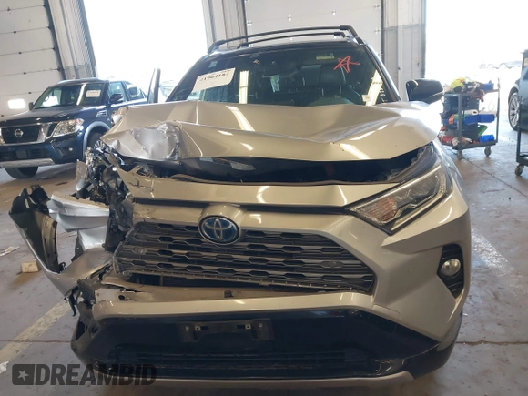 2021 Toyota RAV4 Hybrid XSE with VIN JTME6RFV9MJ006665, listed as a IAAI auction lot 41964182 with 61,654 mi miles and . Bid and sale history available at DreamBid. Image 12.