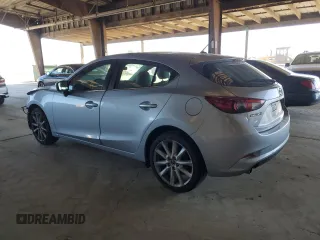 2017 Mazda 3 Touring with VIN 3MZBN1L79HM113024, listed as a Copart auction lot 55831015 with 102,267 mi miles and Salvage title. Bid and sale history available at DreamBid. Image 2.