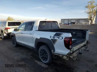 2022 Honda Ridgeline RTL-E with VIN 5FPYK3F77NB031233, listed as a Copart auction lot 49735525 with 71,450 mi miles and Salvage Title. Bid and sale history available at DreamBid. Image 2.