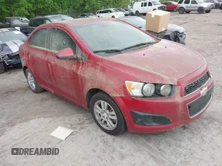 2015 Chevrolet Sonic LT with VIN 1G1JC5SH5F4126280, listed as a IAAI auction lot 42101576 with 144,333 mi miles and . Bid and sale history available at DreamBid. Image 1.