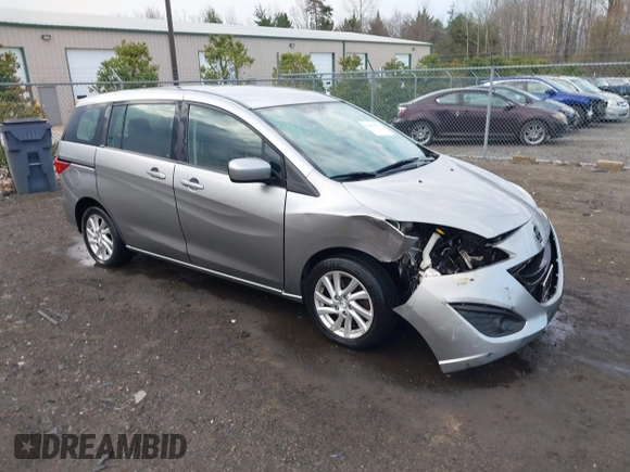 2012 Mazda 5 Sport with VIN JM1CW2BLXC0107933, listed as a IAAI auction lot 41813231 with 164,395 mi miles and . Bid and sale history available at DreamBid. Image 1.