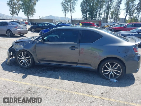 2015 Scion tC with VIN JTKJF5C74F3090309, listed as a IAAI auction lot 41988036 with 158,240 mi miles. Bid and sale history available at carsss.com. Image 14.